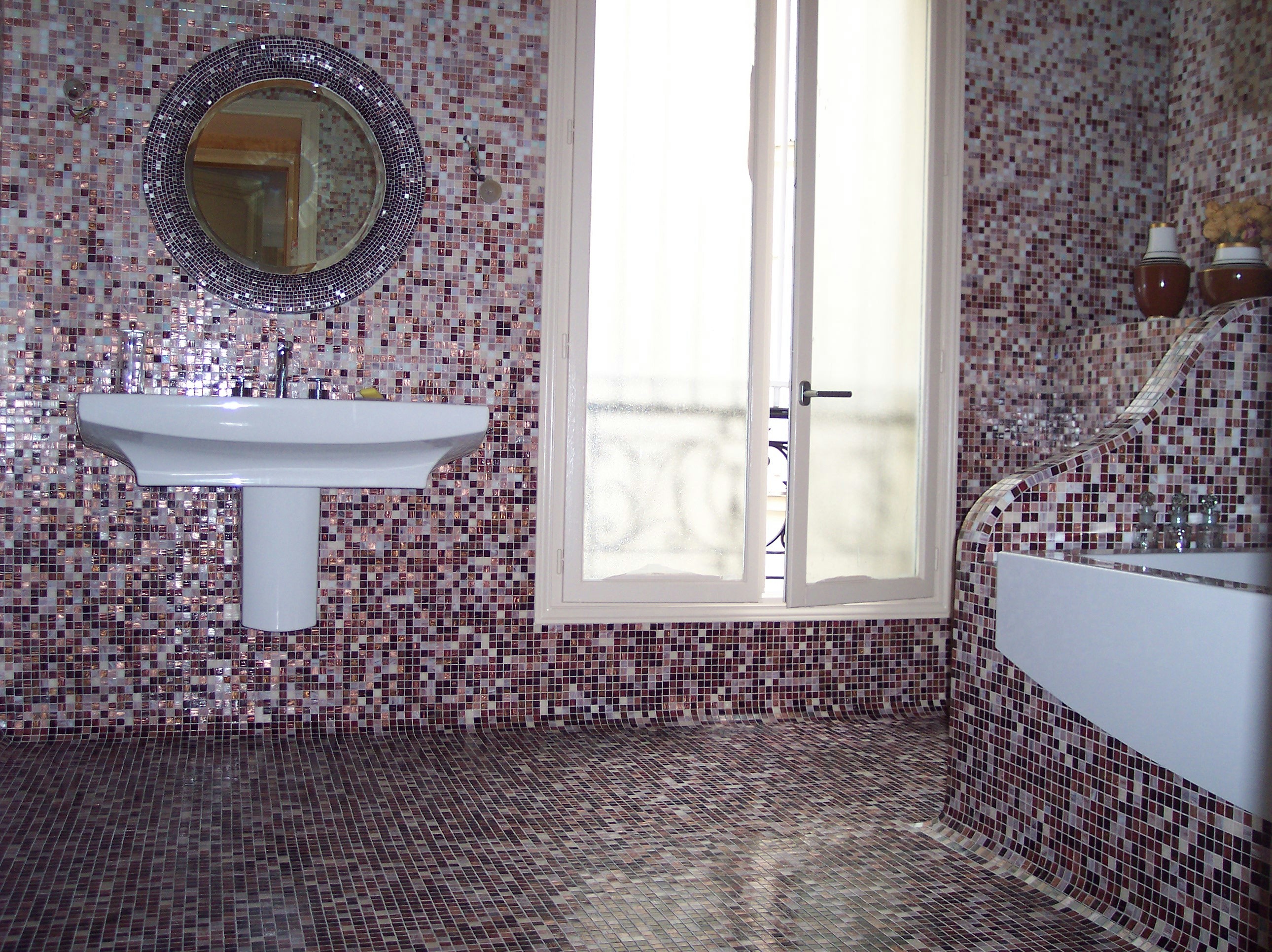 Floor mosaic with rounded corners and sculpted mosaic mirror